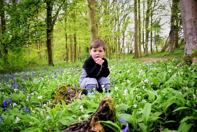 Girl sitting in a forest