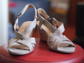 Close-up of shoes on table