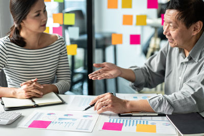 Business colleagues working at office