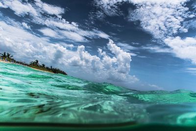 Scenic view of sea against cloudy sky