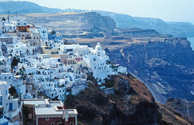 High angle view of houses and mountains against sky