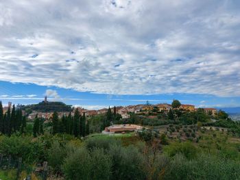 Scenic view of townscape against sky