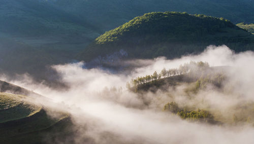 View of mountain during foggy weather