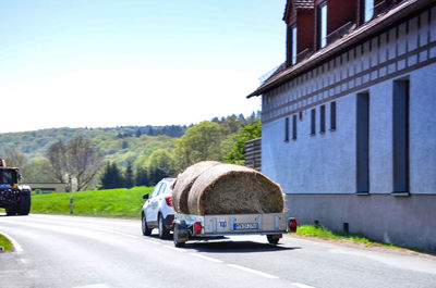 View of road in city against clear sky