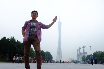 Full length of man standing against sky