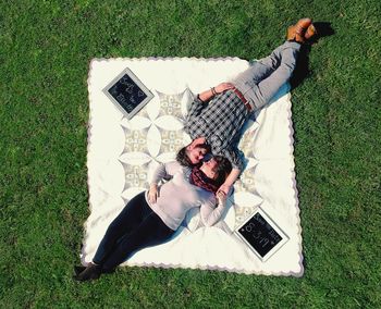 High angle view of man using mobile phone on field