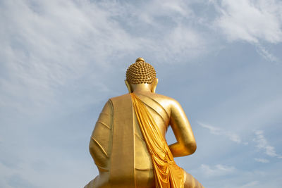 Low angle view of statue against sky