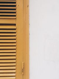 Close-up of yellow door