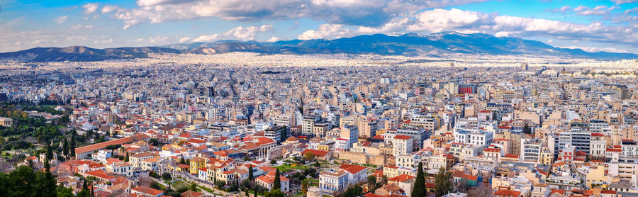 Athens, greece - february 13, 2020. panoramic view over the athens city, ancient agora of athens