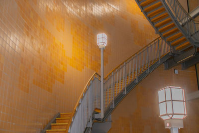Low angle view of illuminated staircase in building