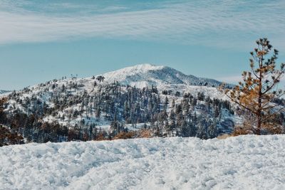 Scenic view of mountains against sky during winter