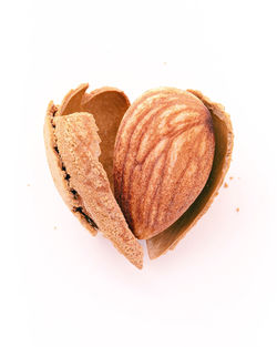 High angle view of bread on white background