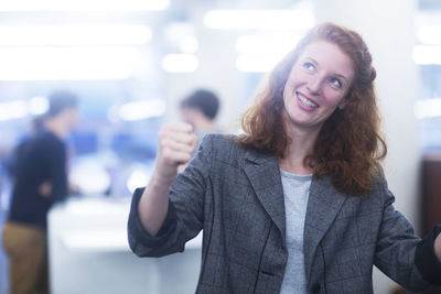 Employee in an office excited and happy