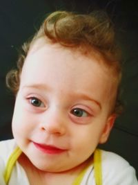 Close-up portrait of smiling girl
