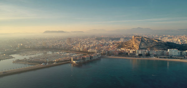 High angle view of river amidst buildings in city