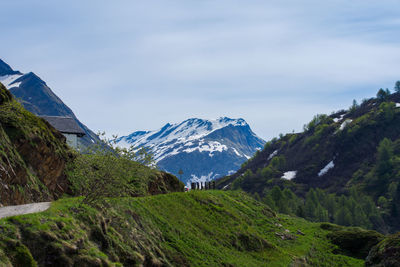 Scenic view of snowcapped mountains against sky