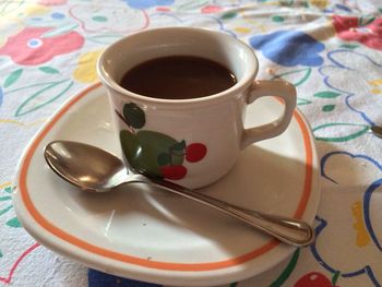 Close-up of coffee cup on table