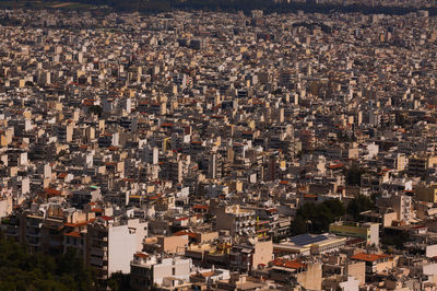 Dense buildings in athens, greece, as seen from mount poikilo.