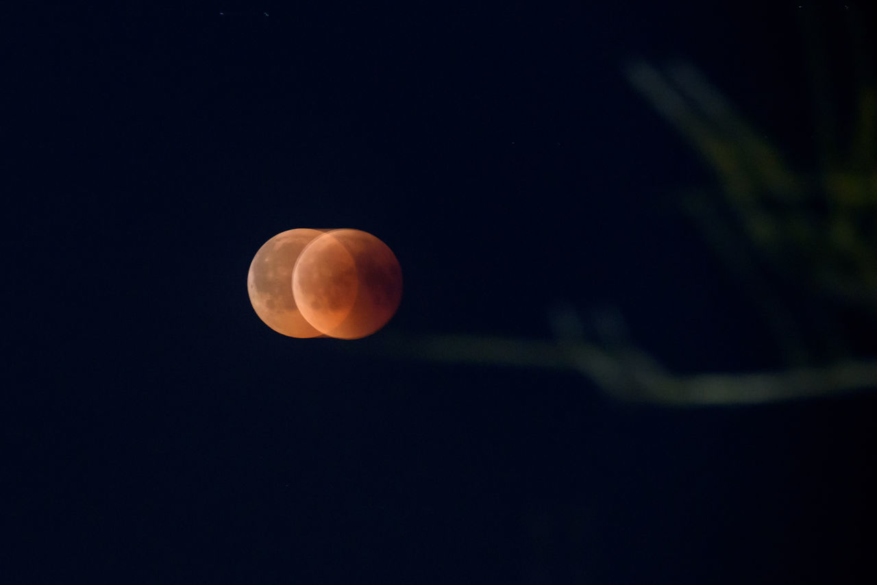 VIEW OF MOON AGAINST SKY