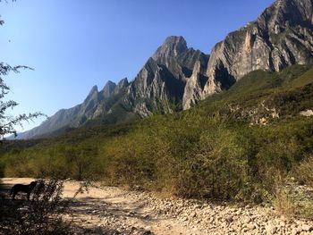 Scenic view of mountains against clear sky