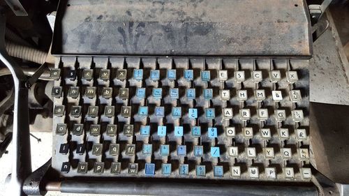 High angle view of messy old typewriter