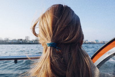 Woman looking at river