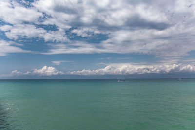 Seascape horizon sea and blue cloudy sky