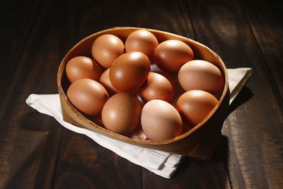 High angle view of eggs in container on table