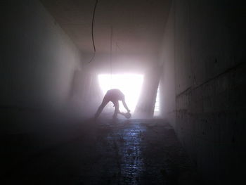 Silhouette of man in fog