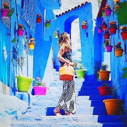 Full length rear view of girl in colorful dress