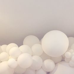 Close-up of candies against white background