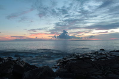 Scenic view of sea against sky during sunset