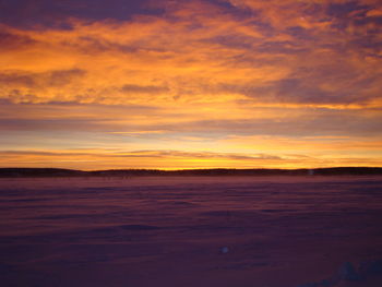 Scenic view of dramatic sky over sea