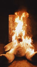 Close-up of fire burning at night