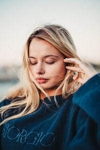 Portrait of woman with eyes closed