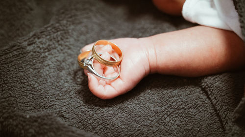 Close-up of woman holding hands