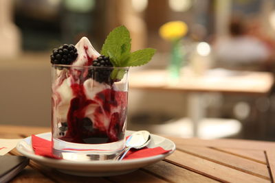 Close-up of dessert in glass on table