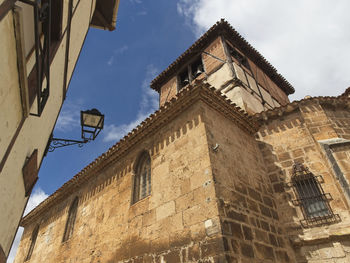Low angle view of old building against sky