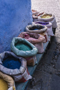 High angle view of powder dyes for sale at market