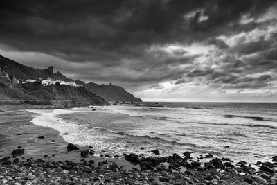 Scenic view of atlantic ocean against cloudy sky