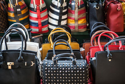 Close-up of purses at market stall