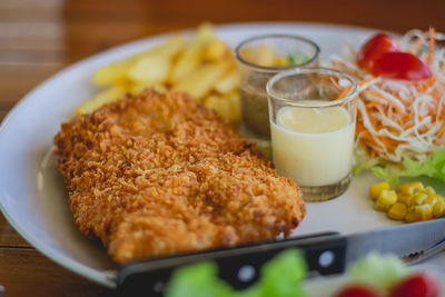 Close-up of breakfast served on table