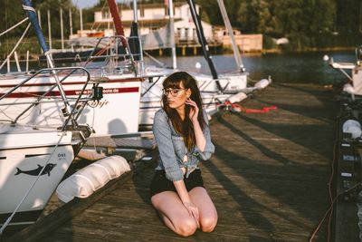 Portrait of woman sitting in boat