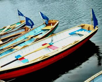 Boats moored in sea