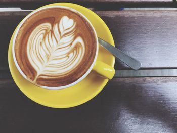 Close-up of cappuccino on table