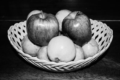 High angle view of apples in basket on table