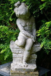 Statue of plants in garden
