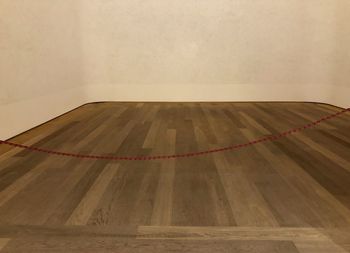 View of empty hardwood floor against wall