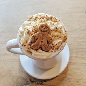 High angle view of coffee cup on table