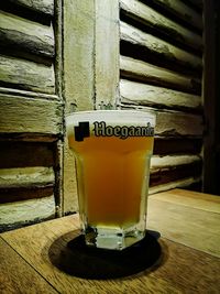 Close-up of beer glass on table